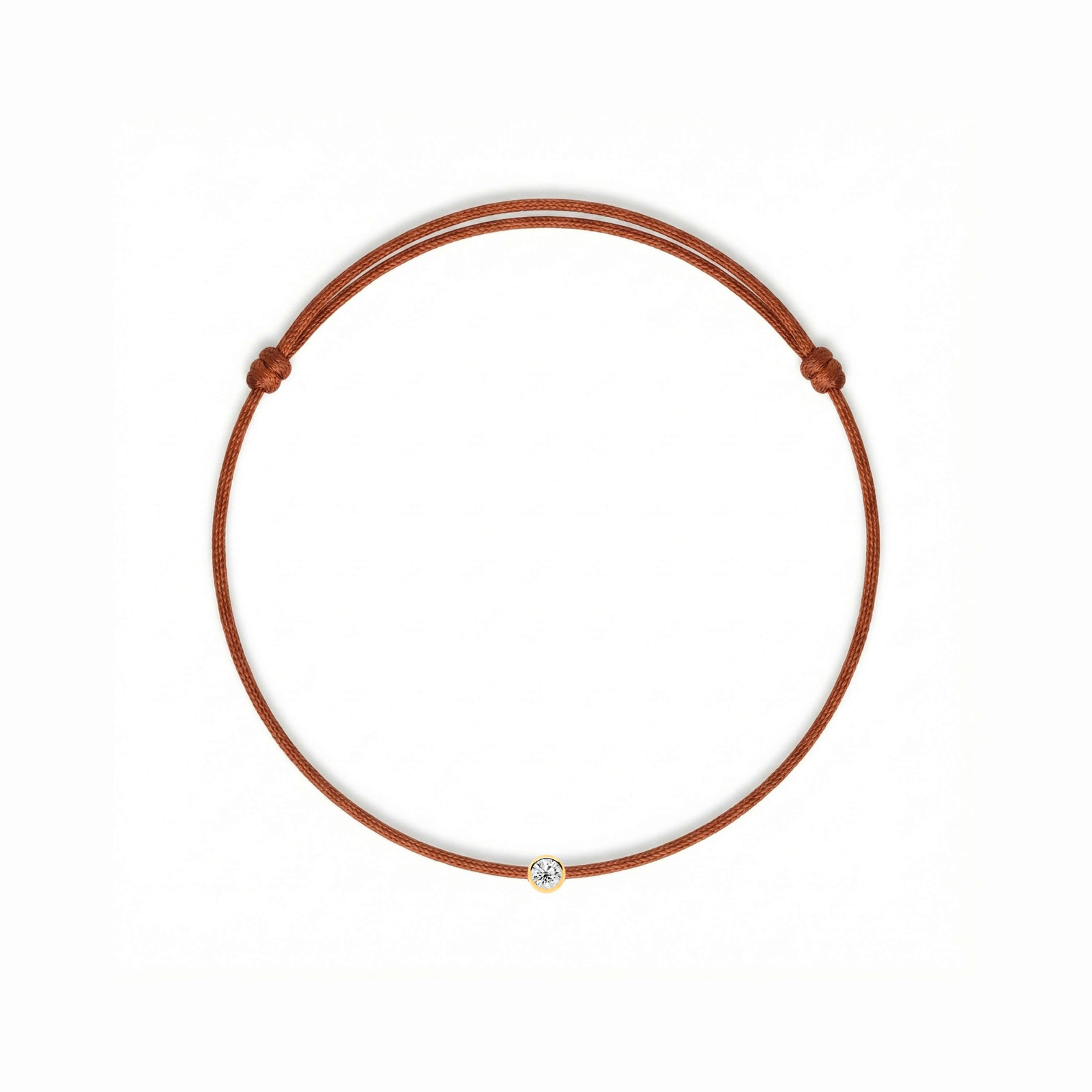 Miedziana bransoletka na sznurku z diamentem