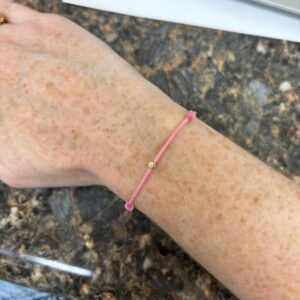 Love it but wish I could have gotten the diamond string bracelet smaller size. I have it so tight you can see the knots lol