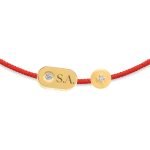 Bracelet à perles en forme de losanges et de points